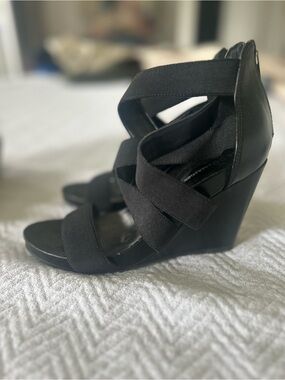 BCBGeneration Black Elastic Crossover Wedge Sandals